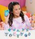 Фигурка-сюрприз в капсуле STITCH серии "Feed Me" - СТИЧ СО ВКУСНЯШКАМИ (в ассорт., в диспл.), комбинированый