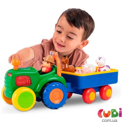 Іграшка на колесах - ТРАКТОР З ТРЕЙЛЕРОМ (на колесах, світло, озвуч. українською мовою)